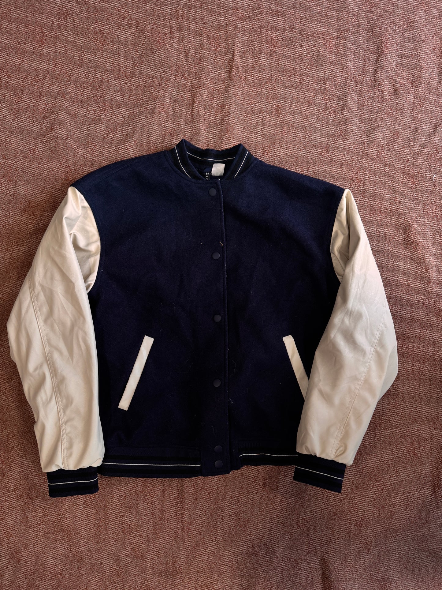 College varsity tg. 42/44