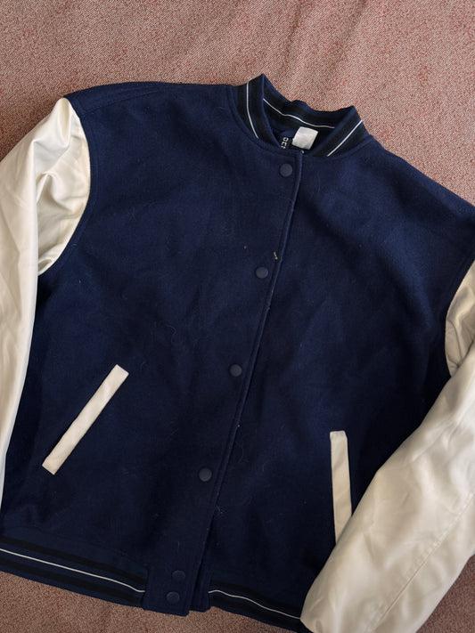 College varsity tg. 42/44